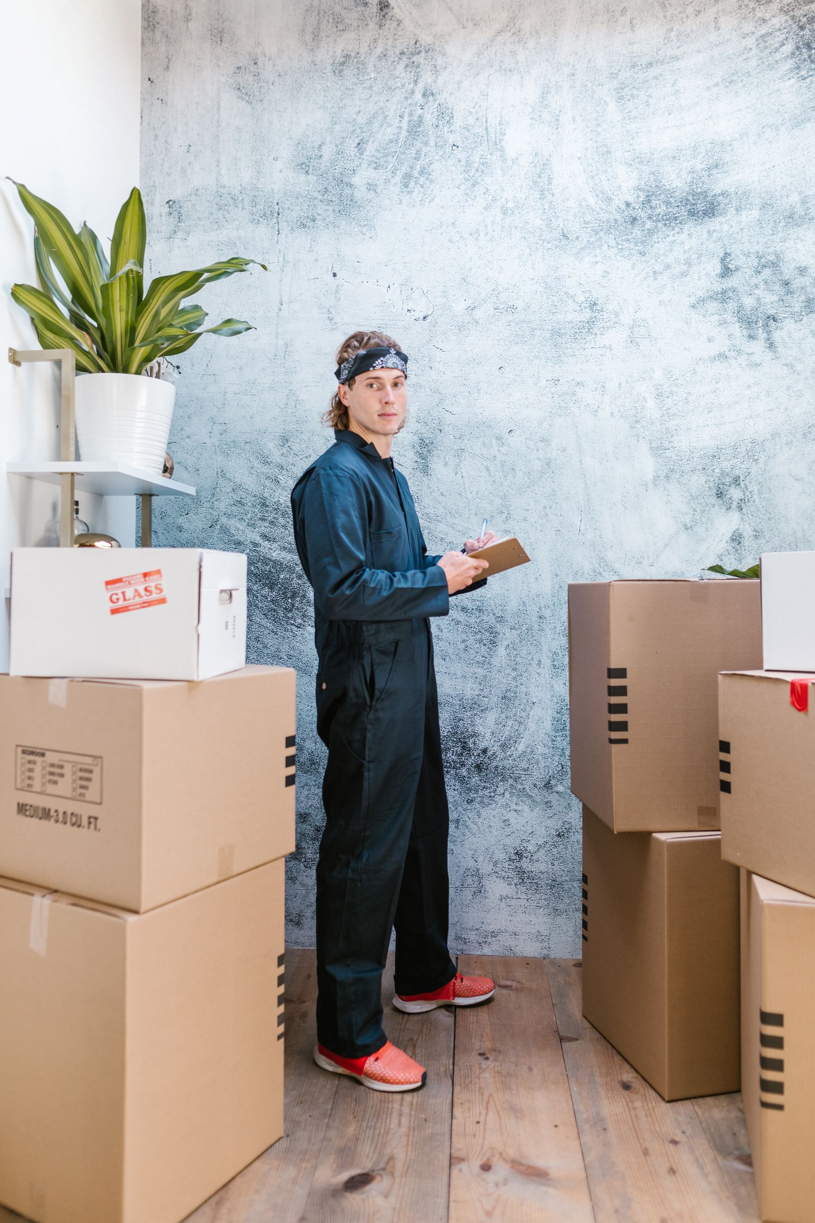 Person packing boxes during a move